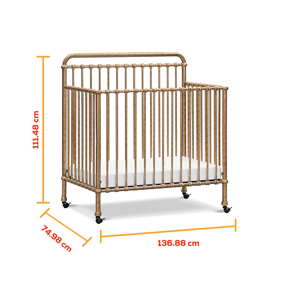Cuna de metal convertible 3 en 1 Americana marca Namesake en color Vintage Oro
