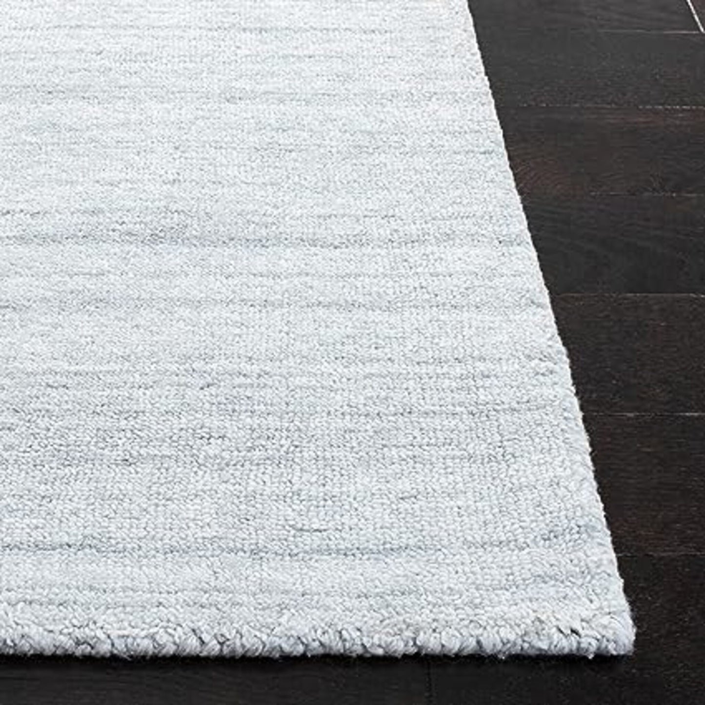 Alfombra Americana marca Safavieh hecha a mano en color Gris claro